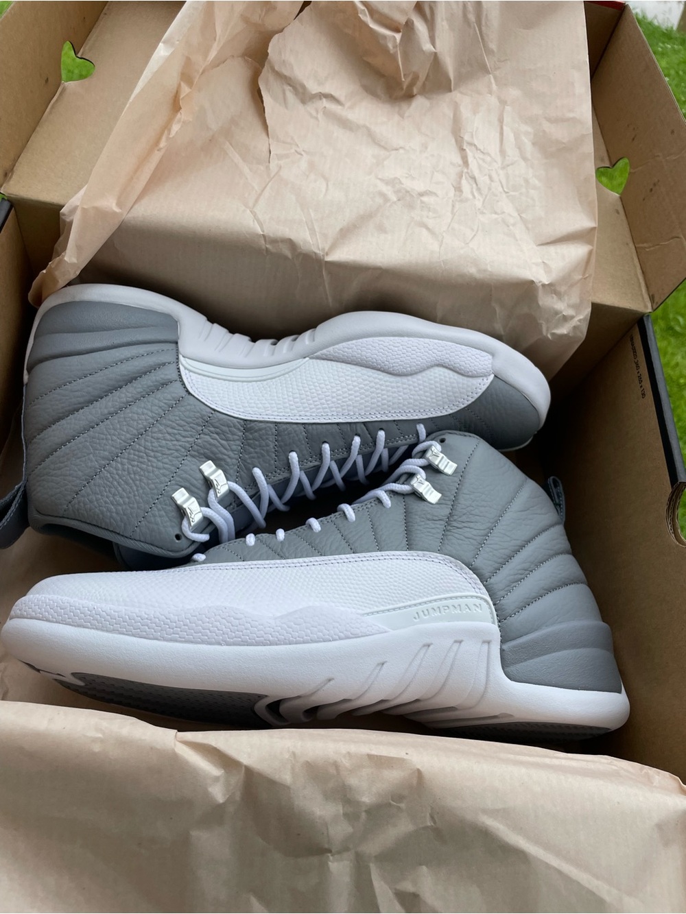 Jordan Retro 12 Sneakers in Grey and White